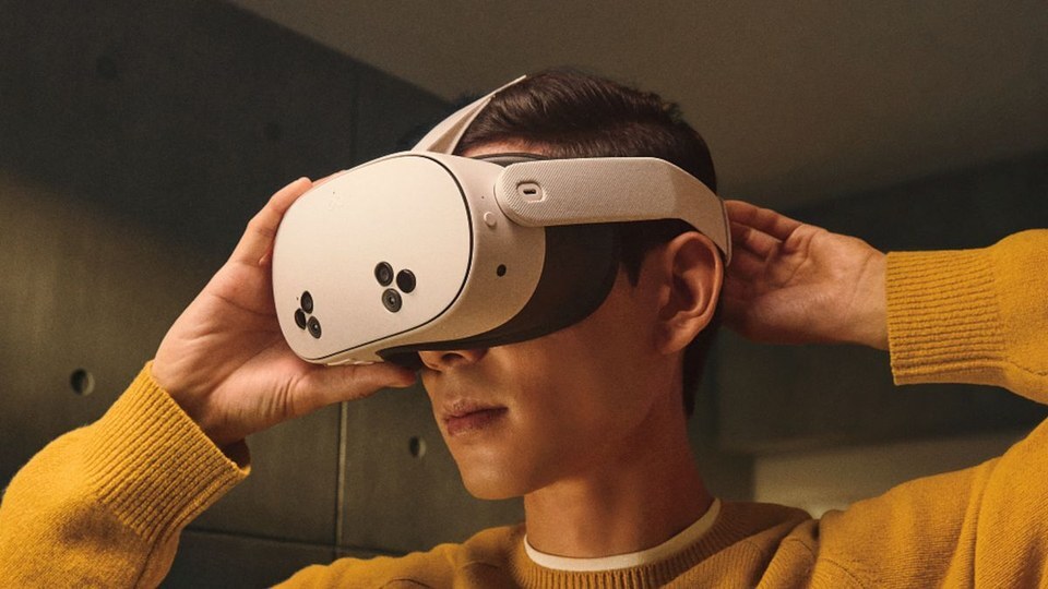 Person putting on a Meta Quest headset