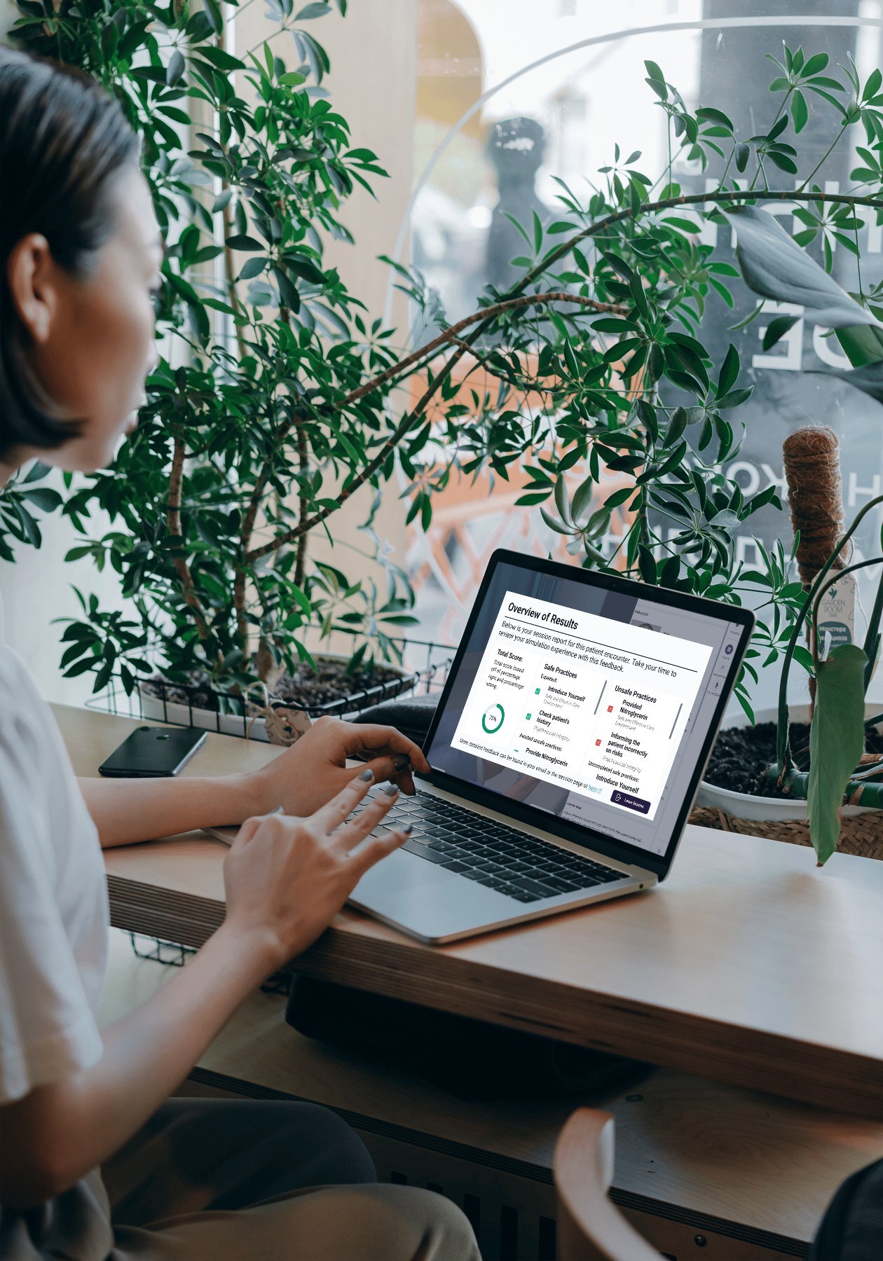 Learner reviewing results on a laptop