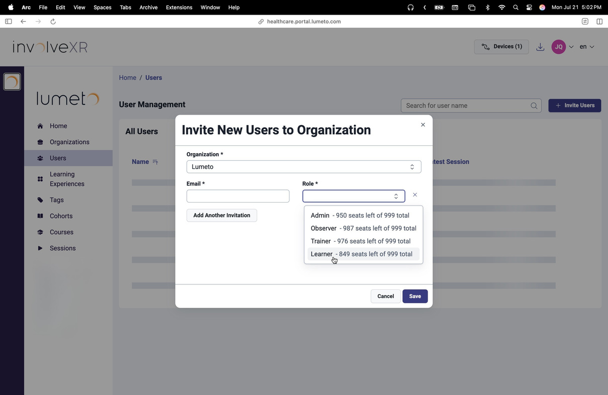 Role dropdown showing seats used and included